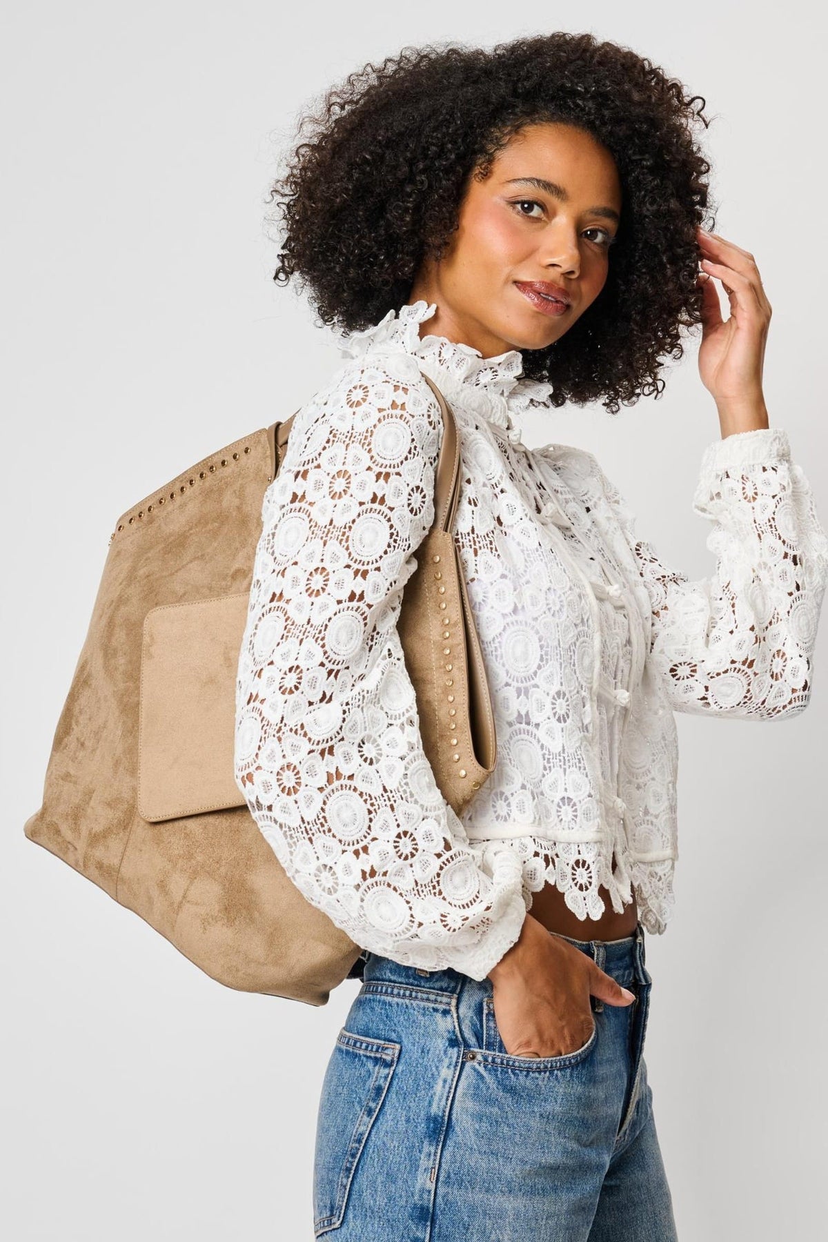 Moda Luxe 64573ML Taupe bag styled on model, view 2