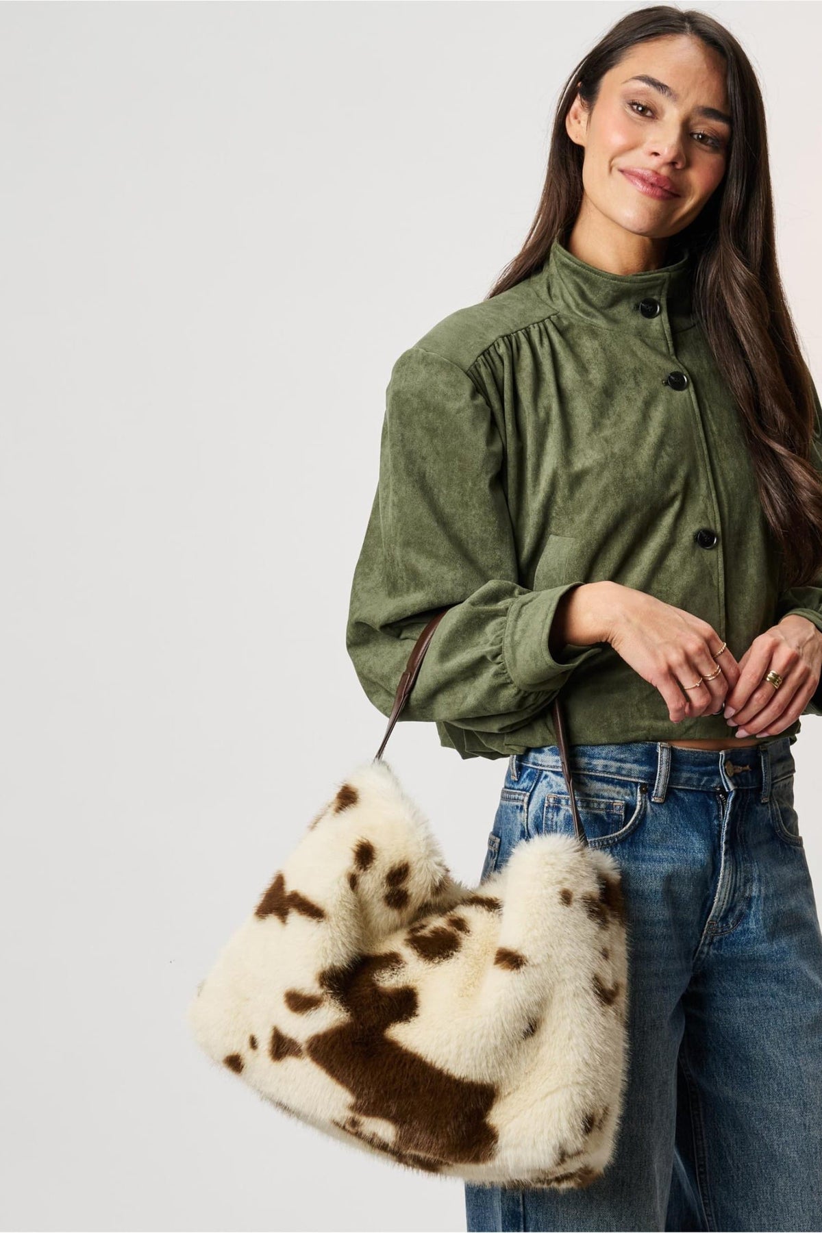 Moda Luxe 64578ML Brown Cream bag styled on model, view 1