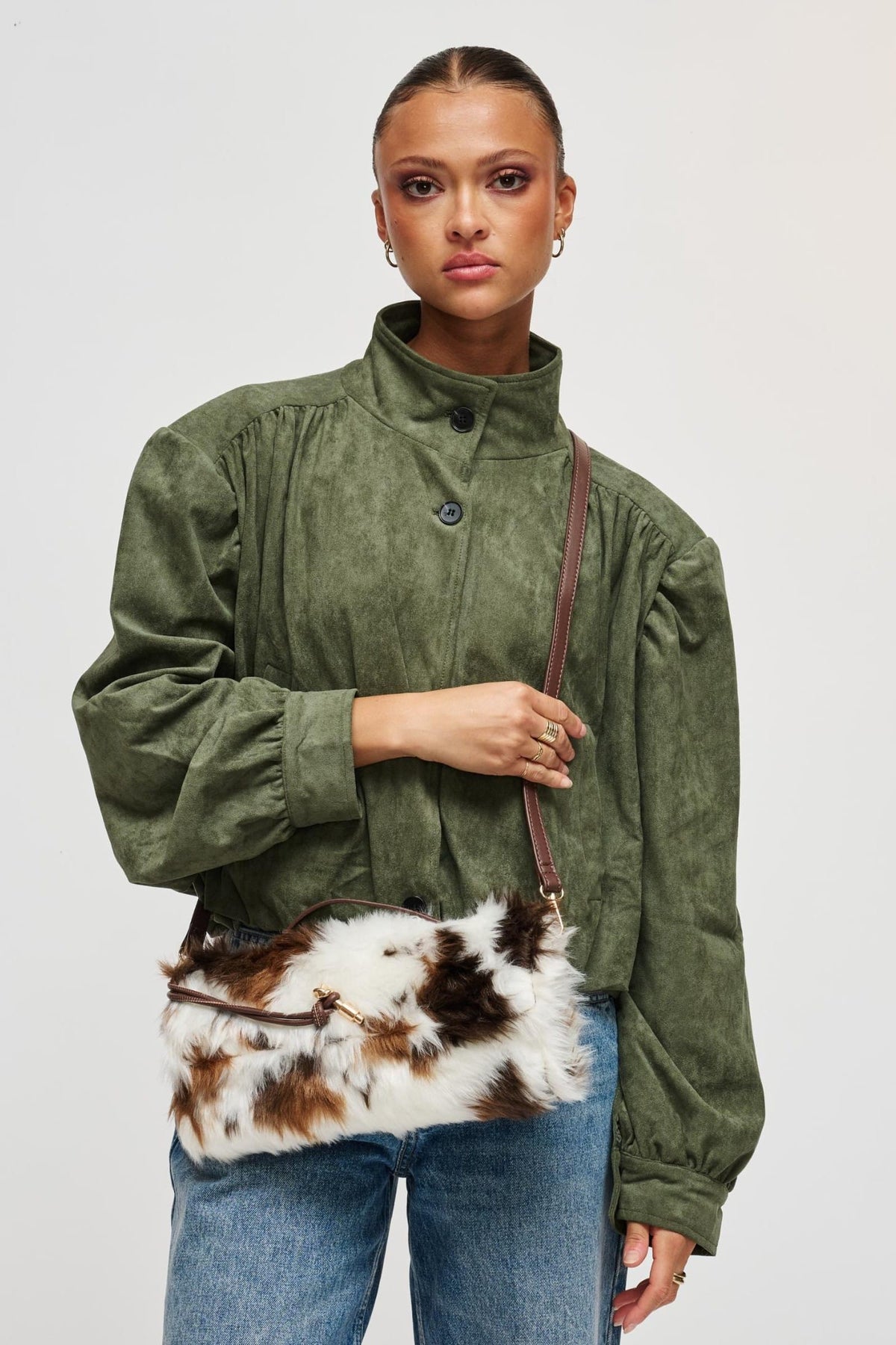 35362CF Brown Cow bag styled on model, view 1