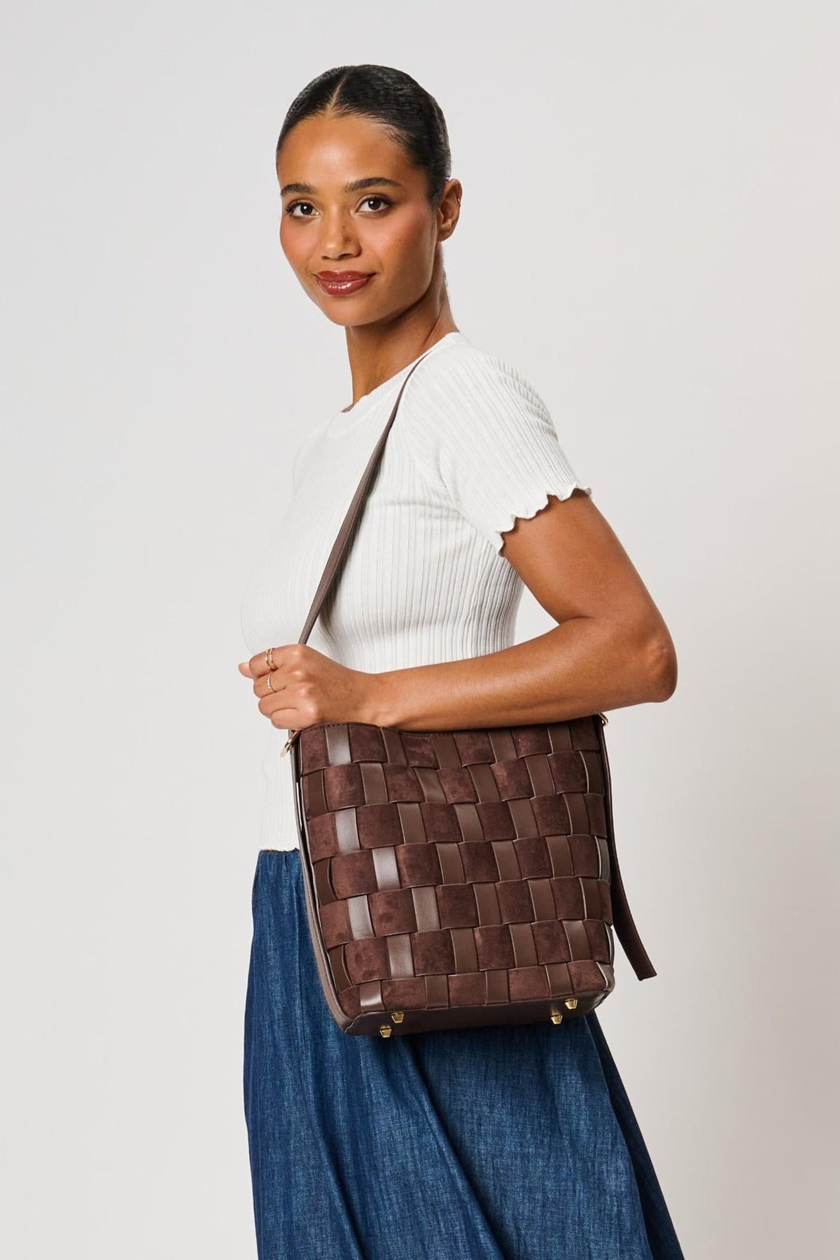 Moda Luxe 38684ML Chocolate bag styled on model, view 1