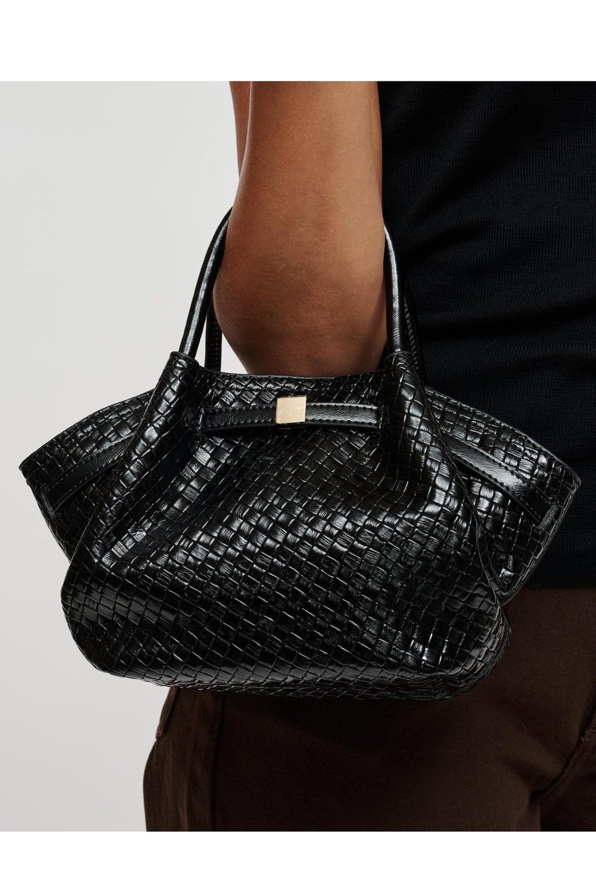 63032BEW Black bag styled on model, view 1
