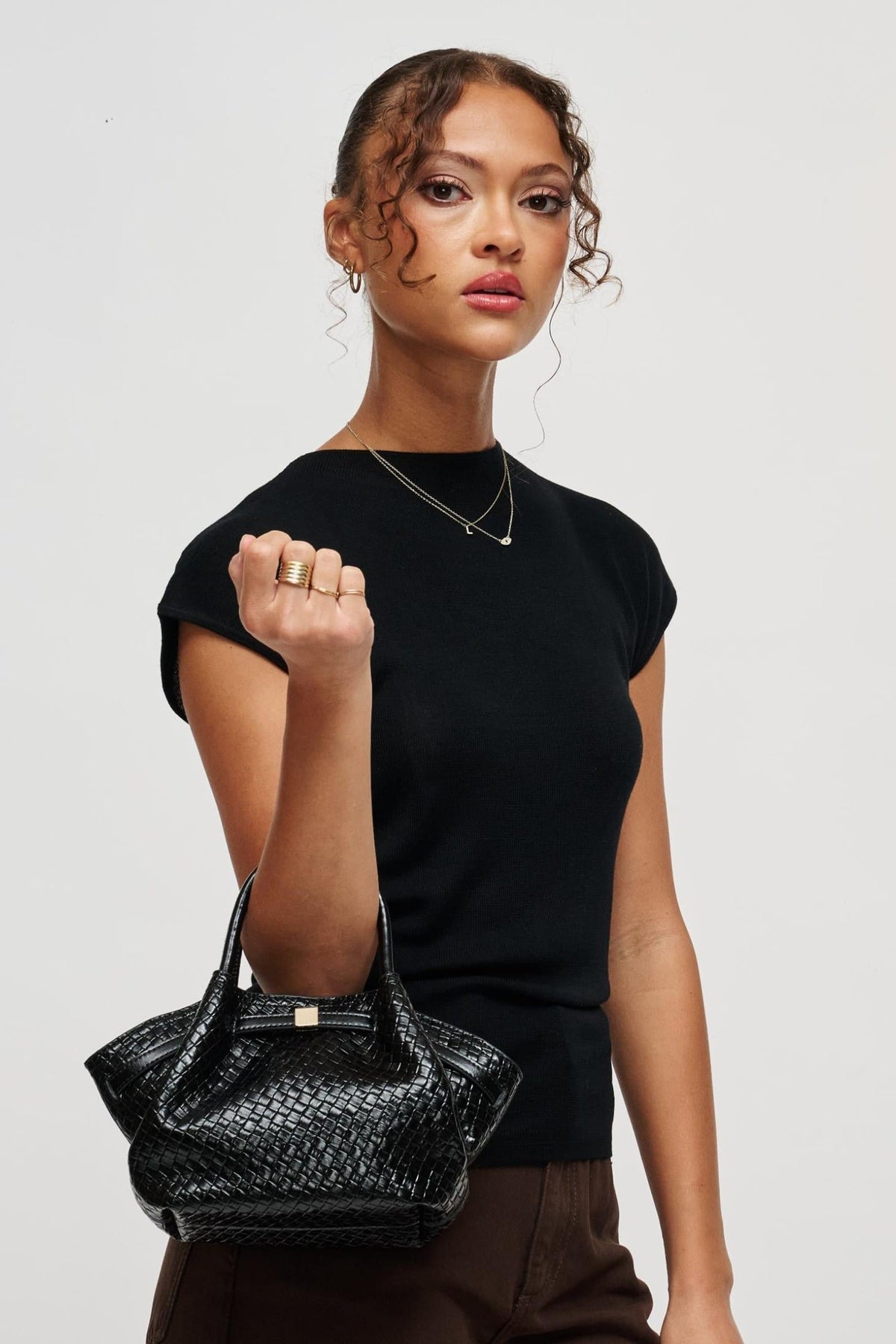 63032BEW Black bag styled on model, view 3