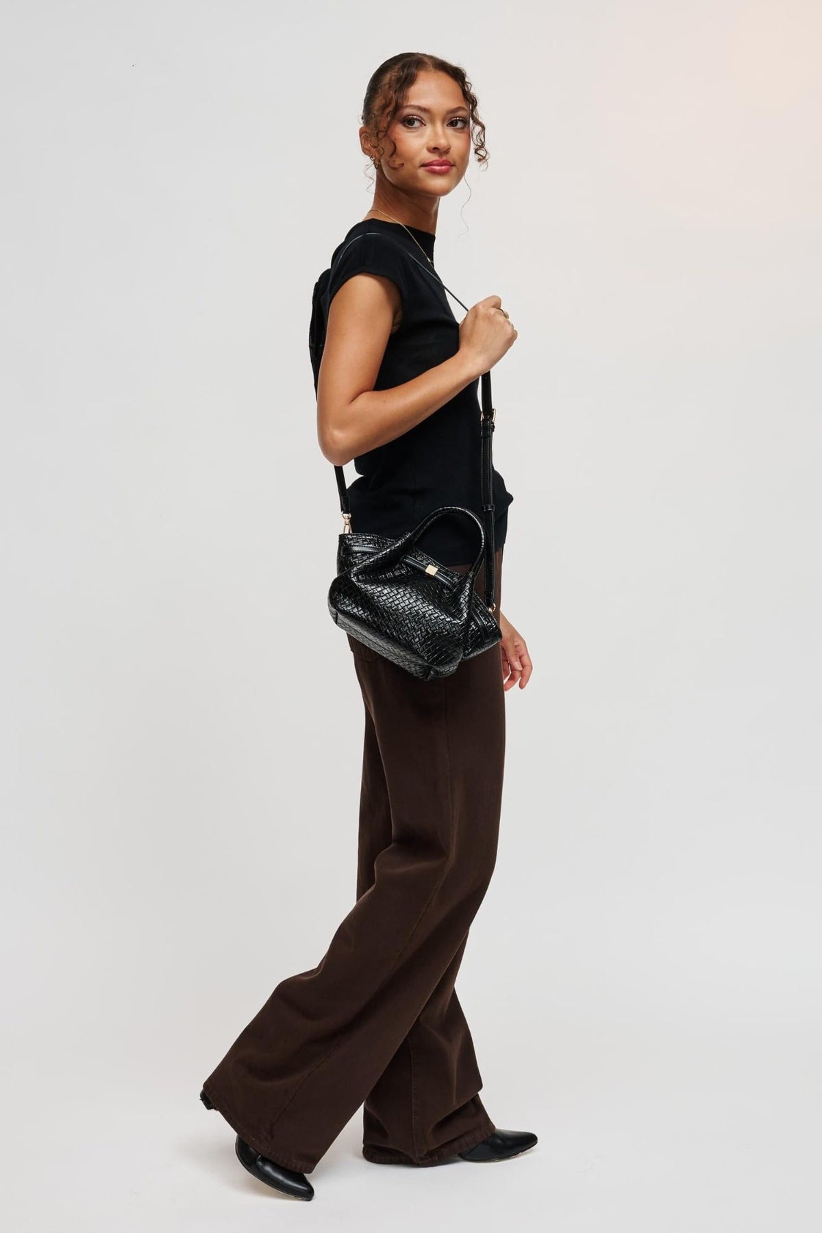 63032BEW Black bag styled on model, view 4