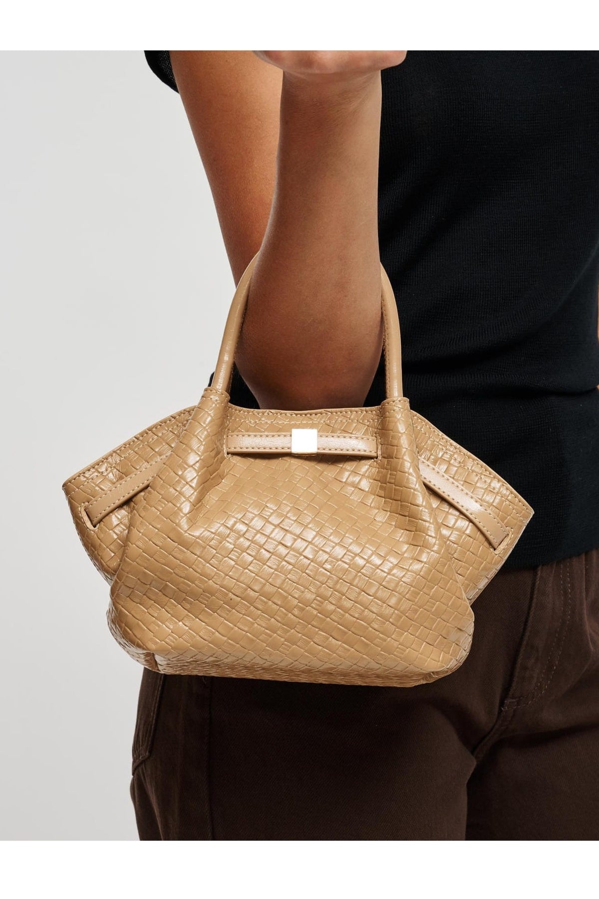 63032BEW Natural bag styled on model, view 1