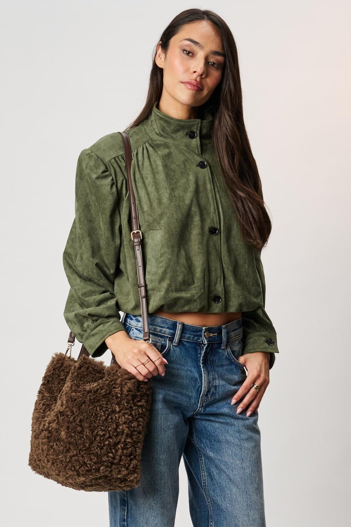 Moda Luxe 64578ML Brown bag styled on model, view 1