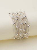CB2175 Metallic Beads And Coils Bracelet Set - MiMi Wholesale