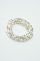 CB2206 7 Piece CCB Pearl Stretch Bracelet Set - MiMi Wholesale