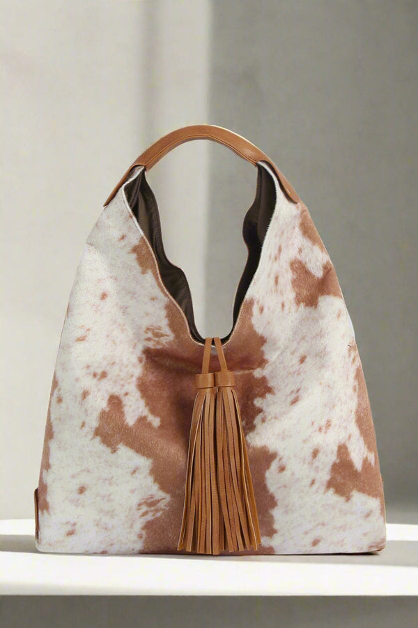 JY0567 Faux Suede Cow Print Hobo Tote Bag With Tassels - MiMi Wholesale