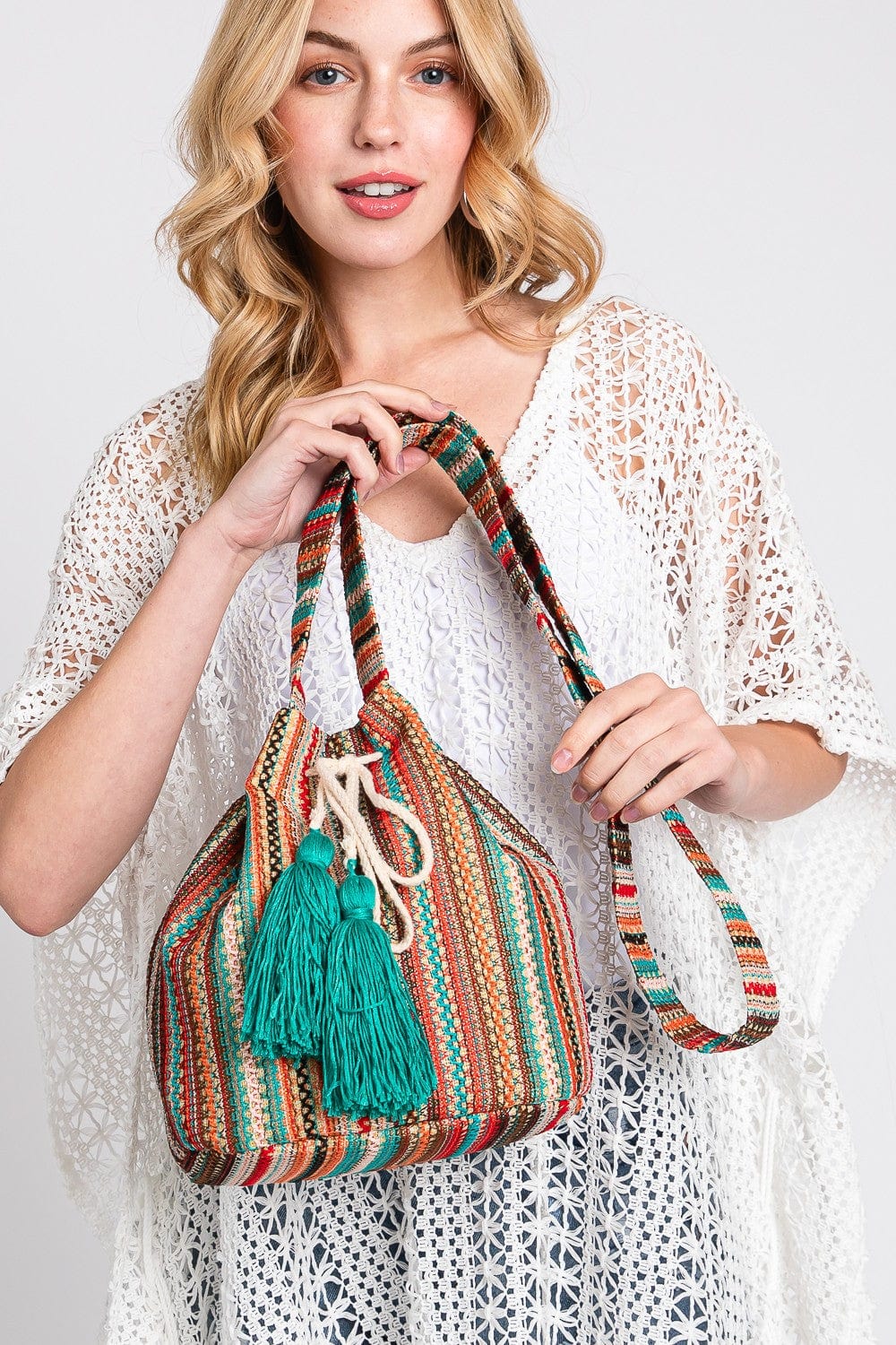 Striped bucket bag sales